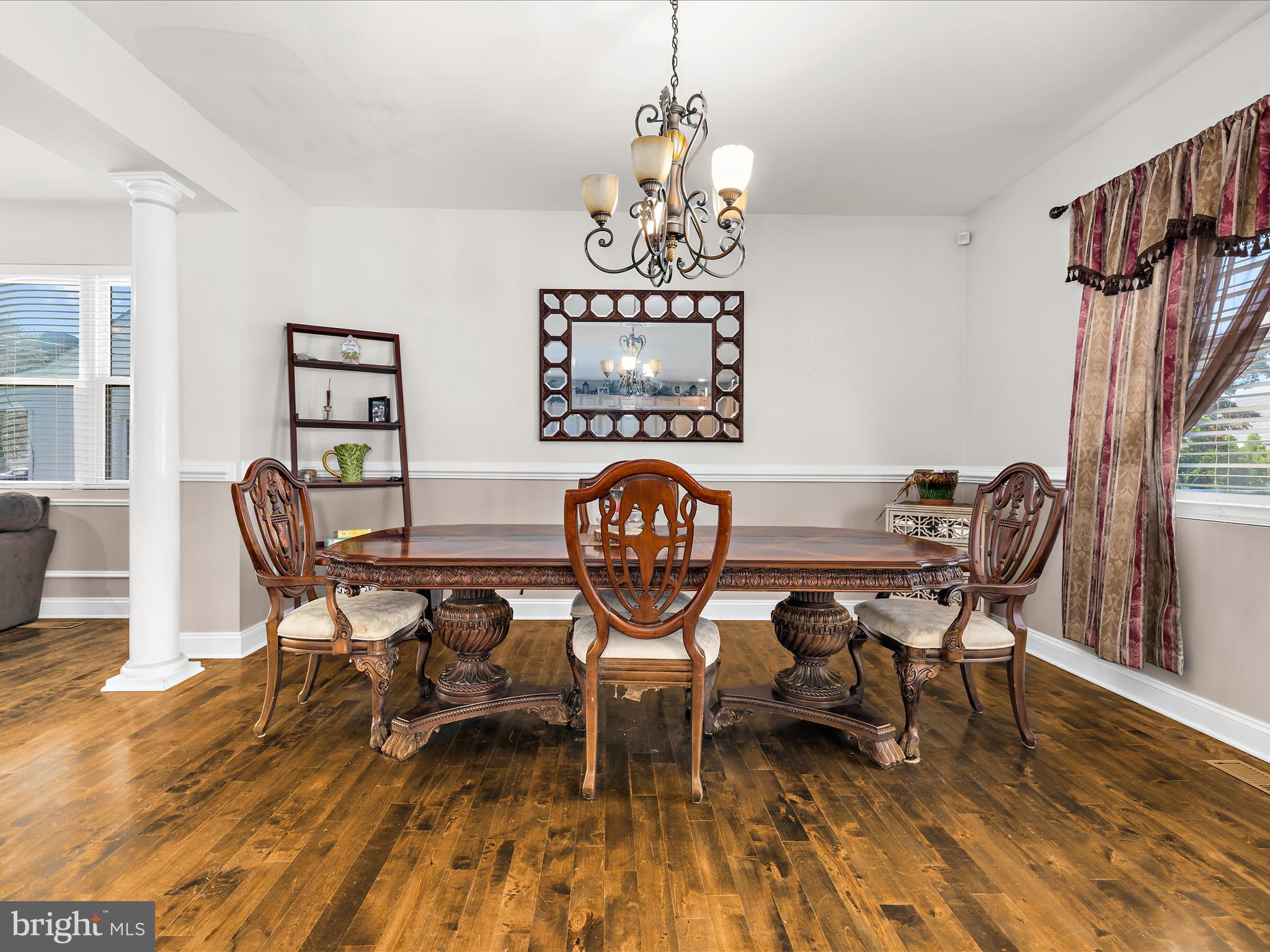 166 Meadow Road Pasadena, MD 21122 - Photo 10 of 47 a view of a dining room with furniture wooden floor and chandelier