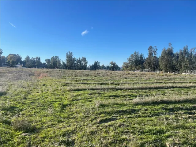 a view of a town with mountains in the background