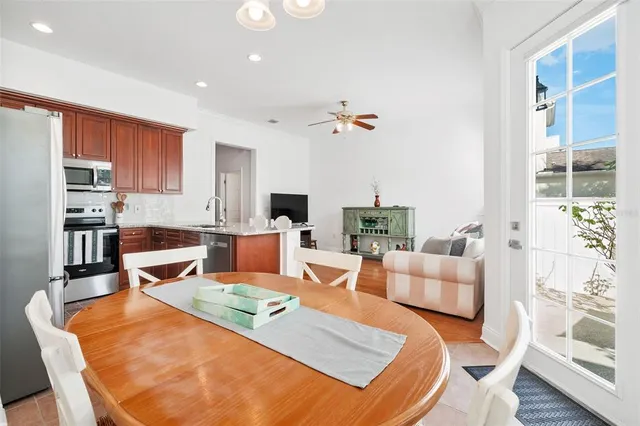 a living room with fireplace furniture and a wooden floor