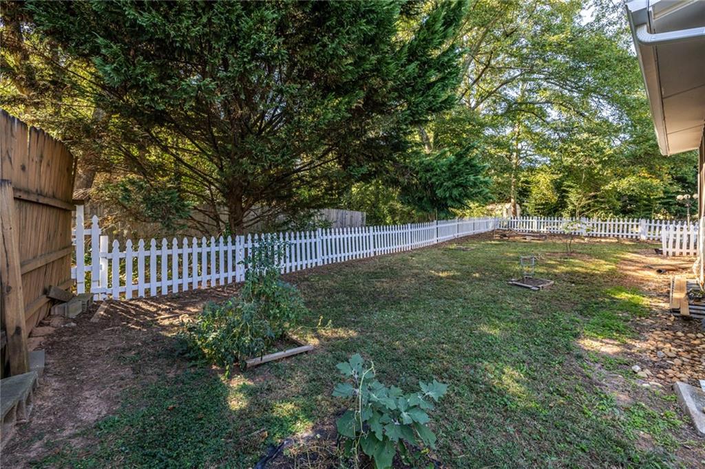1465 Pounds Road Southwest Lilburn, GA 30047 - Photo 28 of 30 a garden view