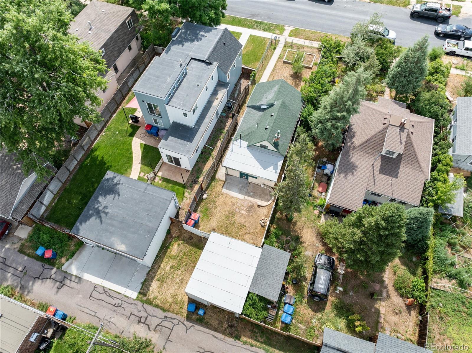 2568 Eaton Street Edgewater, CO 80214 - Photo 16 of 24 an aerial view of a house with a garden and trees