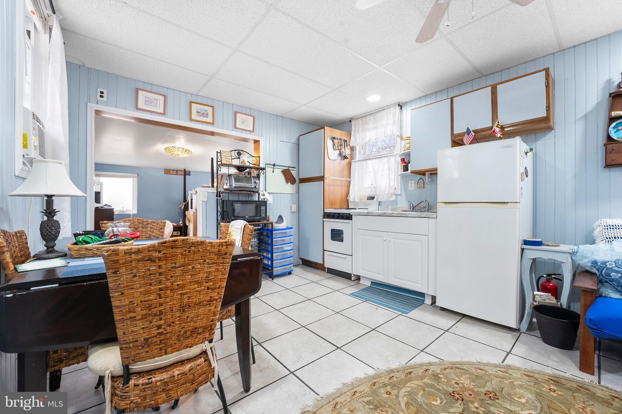 17 Valley Road Earleville, MD 21919 - Photo 7 of 23 a kitchen with stainless steel appliances granite countertop a refrigerator and a stove