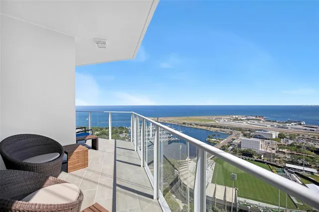 a kitchen with a sink stove top oven and cabinets