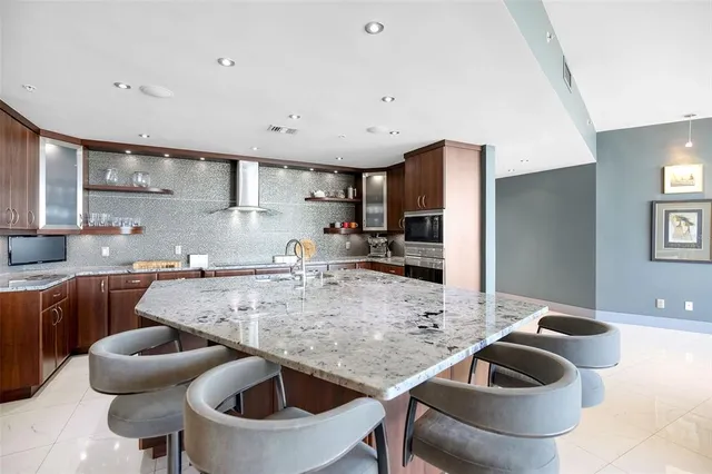 a bathroom with a sink vanity and a mirror