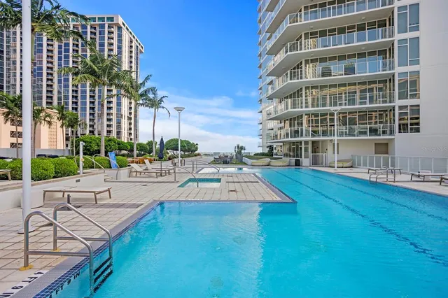 a view of a balcony with chairs
