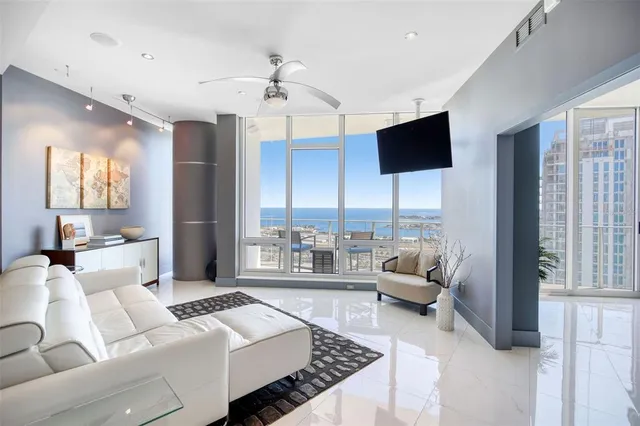 a kitchen with stainless steel appliances granite countertop a sink and a stove