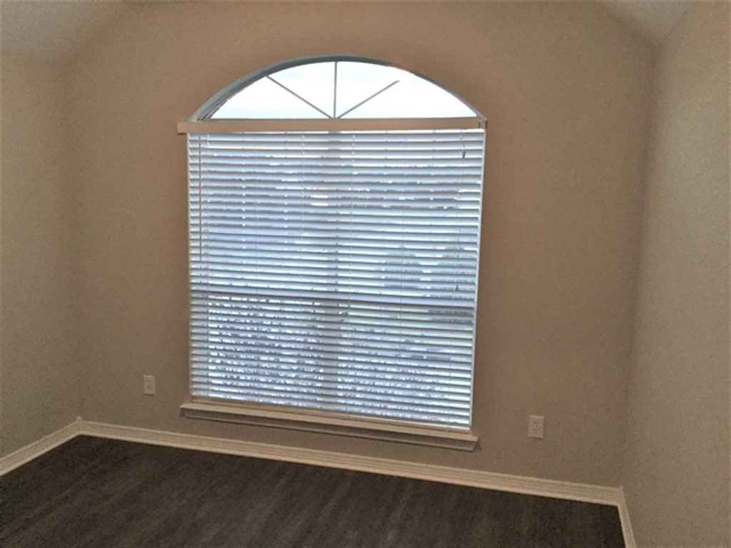 2213 Perkins Crossing Drive Conroe, TX 77304 - Photo 13 of 19 an empty room with a window