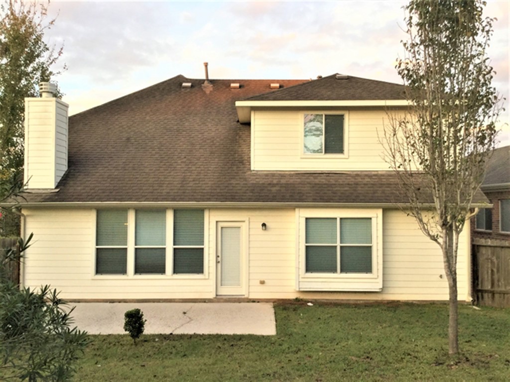 2213 Perkins Crossing Drive Conroe, TX 77304 - Photo 18 of 19 front view of a house
