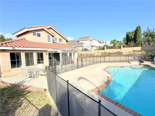 a view of balcony with a potted plant