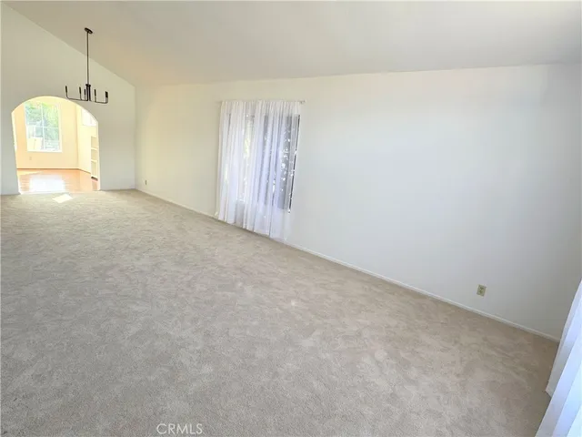 a view of an empty room and window