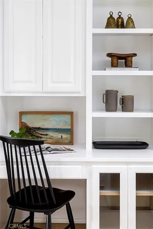 a kitchen with a stove and a cabinets