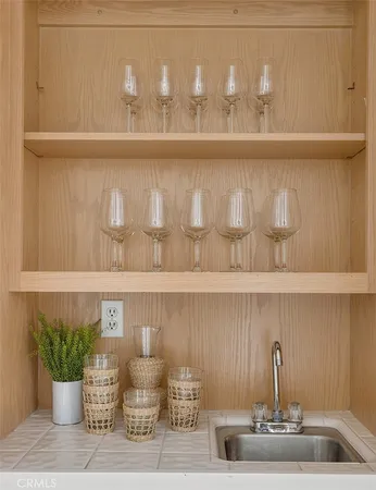 a kitchen with a table and chairs