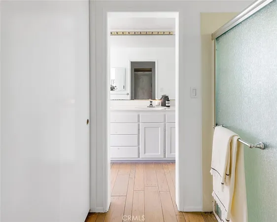 a view of a bedroom from a hallway