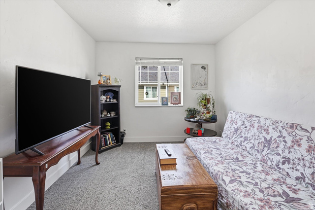 1024 South 270 West Logan, UT 84321 - Photo 20 of 37 Sitting room with light colored carpet and baseboards