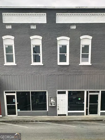 a view of a building with a large window