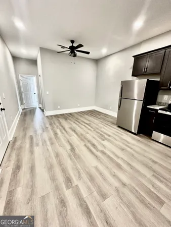 a view of a livingroom with a flat screen tv