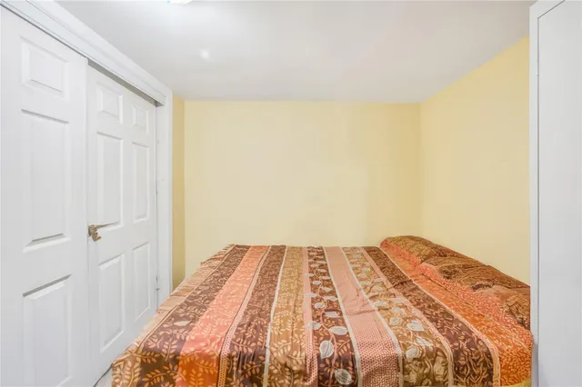 a view of a big room with a bed