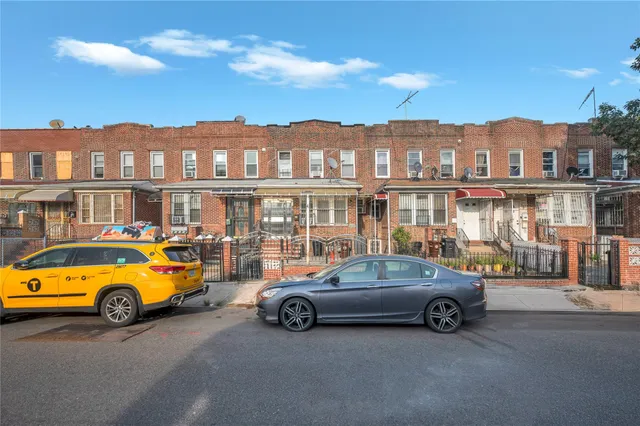 a car parked in front of a house