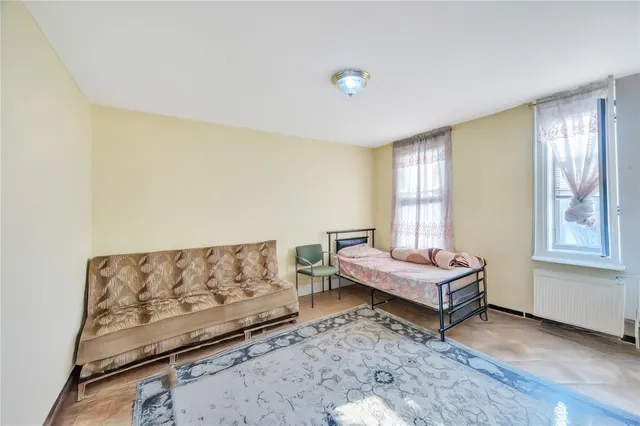a living room with furniture and window
