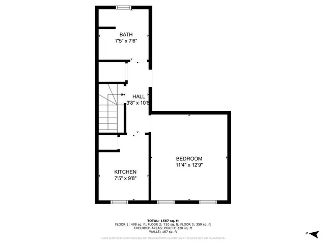 a picture of a bench in front of a wall