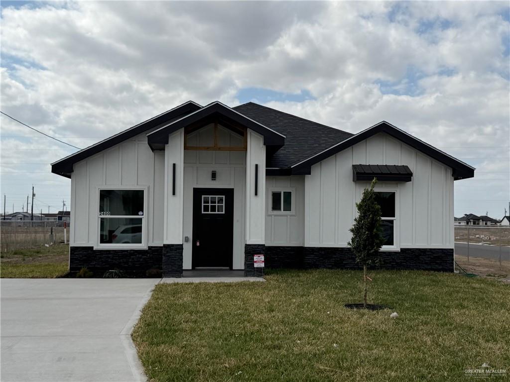 2400 Via Roma Lane Weslaco, TX 78596 - Photo 1 of 1 a front view of a house with a yard