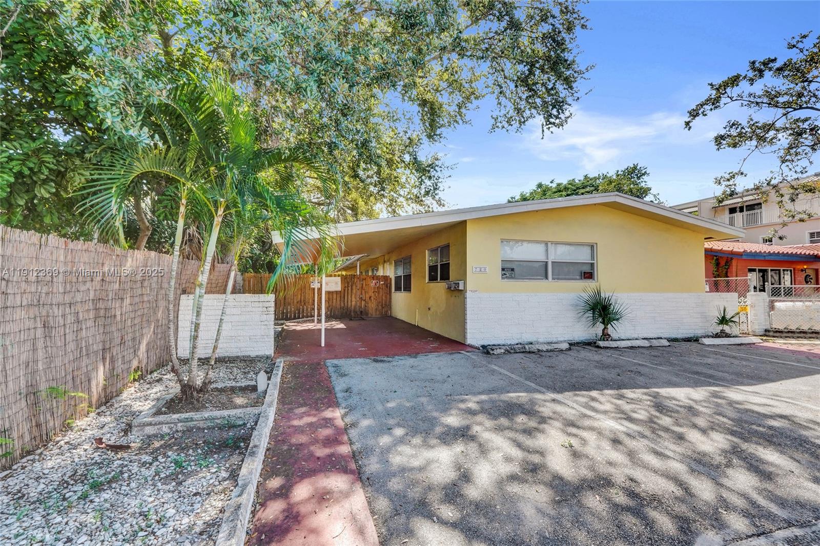 720 Southeast 15th Street, Unit 1 Fort Lauderdale, FL 33316 - Photo 37 of 38 a view of a house with a yard