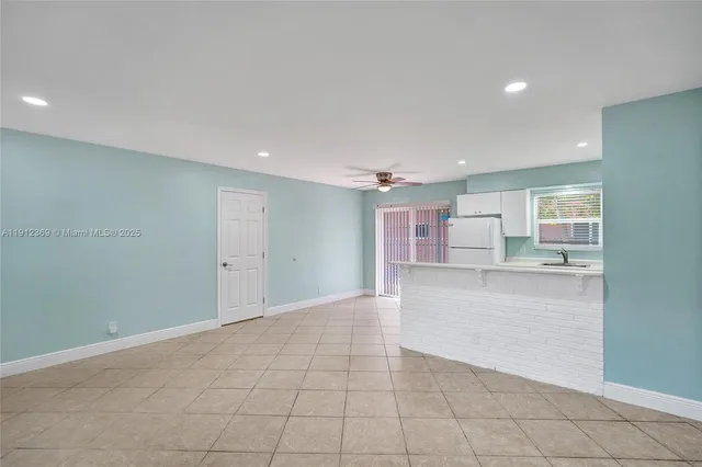 a view of kitchen and windows