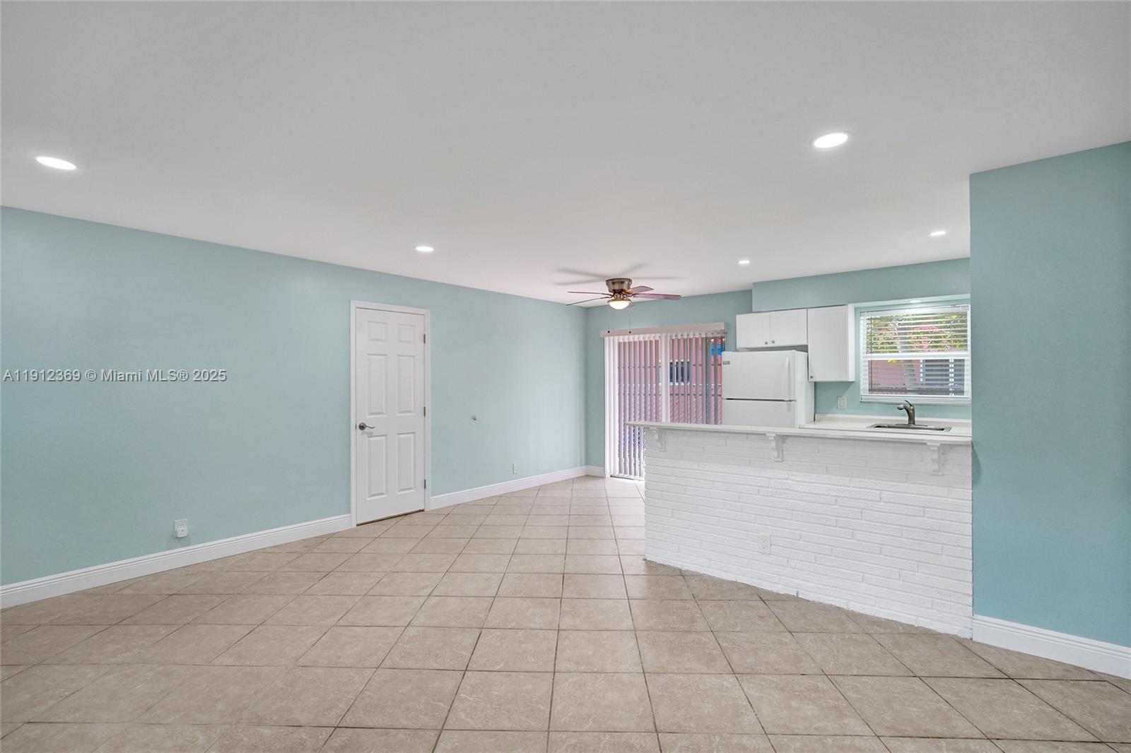 720 Southeast 15th Street, Unit 1 Fort Lauderdale, FL 33316 - Photo 10 of 38 a view of kitchen and windows