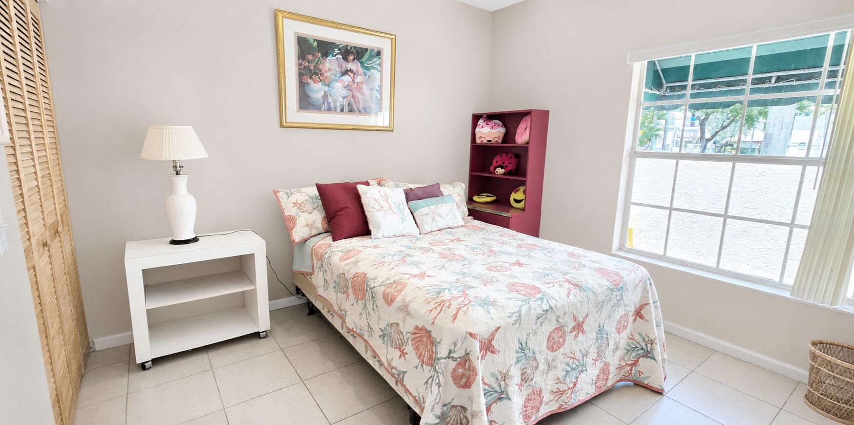 6566 Via Regina, Unit 6566 Boca Raton, FL 33433 - Photo 12 of 17 2nd bedroom overlooks front porch