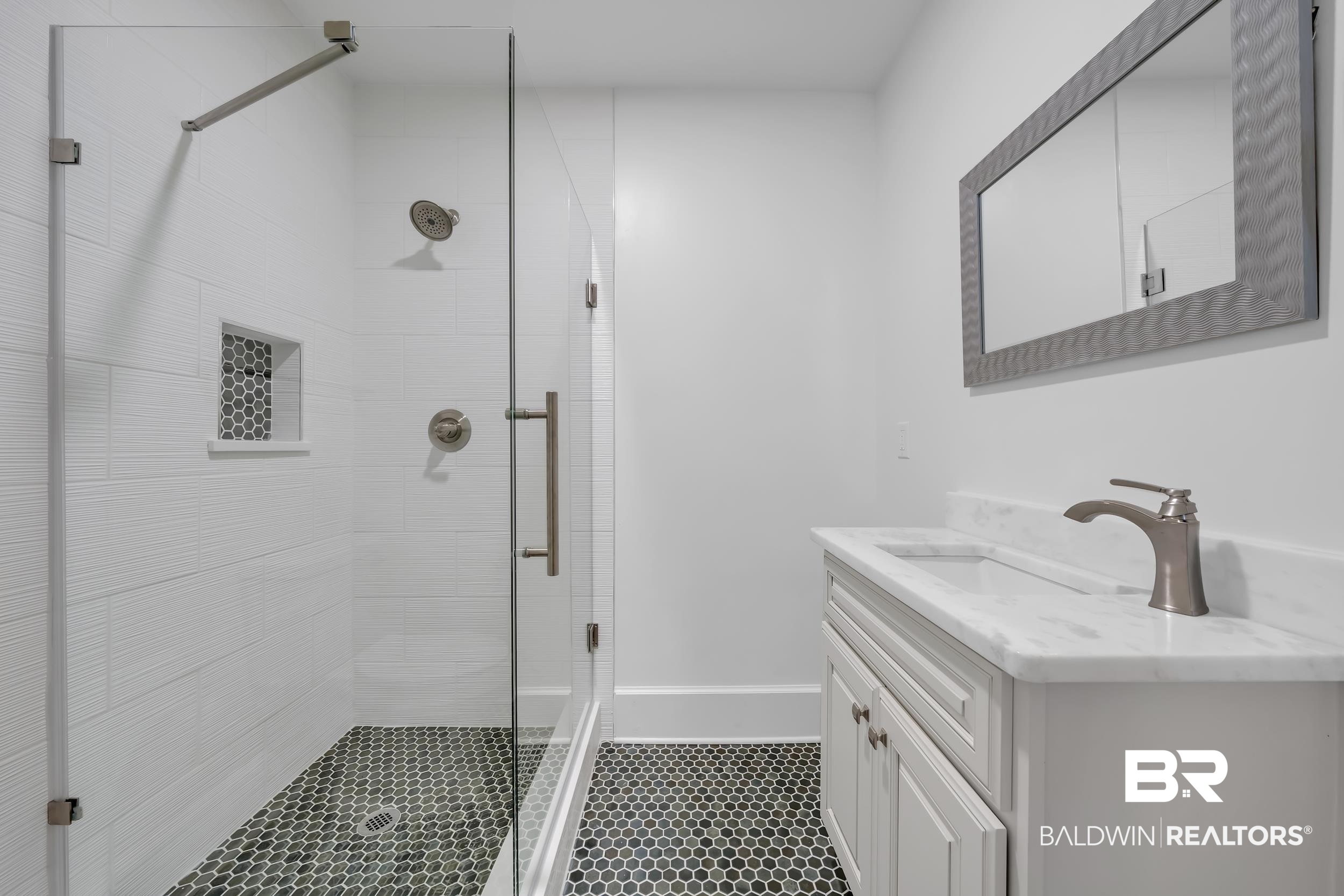1662 Government Street Mobile, AL 36604 - Photo 23 of 33 Bathroom with vanity and a stall shower
