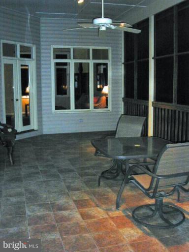 1924 Merrifields Drive Silver Spring, MD 20906 - Photo 13 of 30 28'5" x 13' porch with ceramic flooring