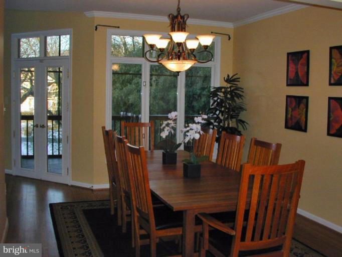 1924 Merrifields Drive Silver Spring, MD 20906 - Photo 14 of 30 Open to porch. Unique curved wall in dining room