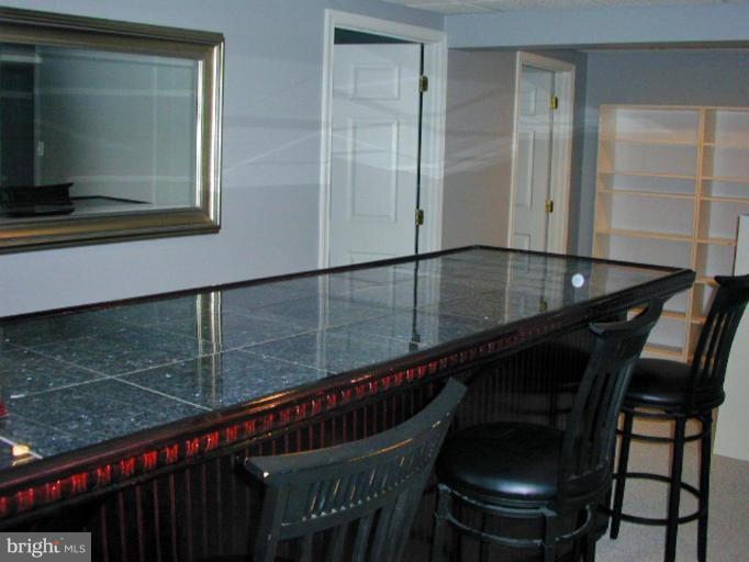 1924 Merrifields Drive Silver Spring, MD 20906 - Photo 22 of 30 Granite-topped bar in basement