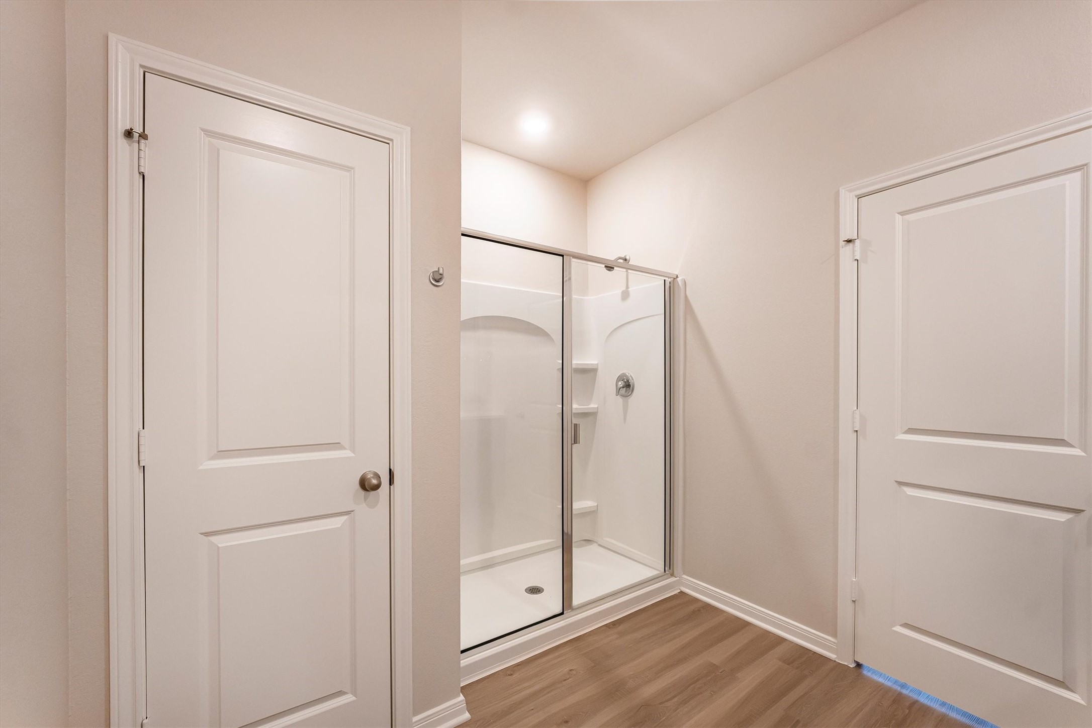 15419 Maple Ter Drive Conroe, TX 77303 - Photo 20 of 32 a bathroom with a glass shower door