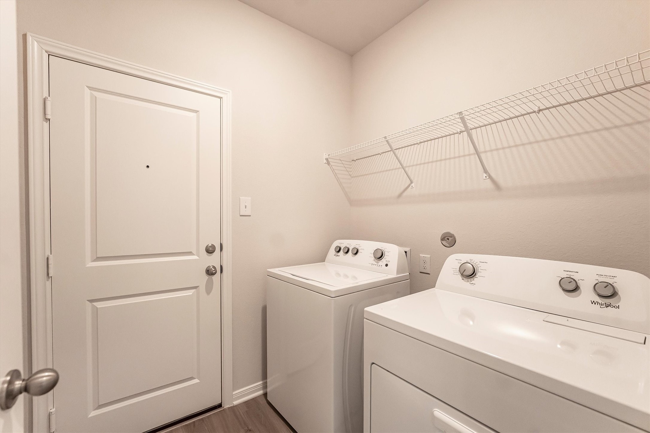 15419 Maple Ter Drive Conroe, TX 77303 - Photo 27 of 32 a utility room with dryer and washer