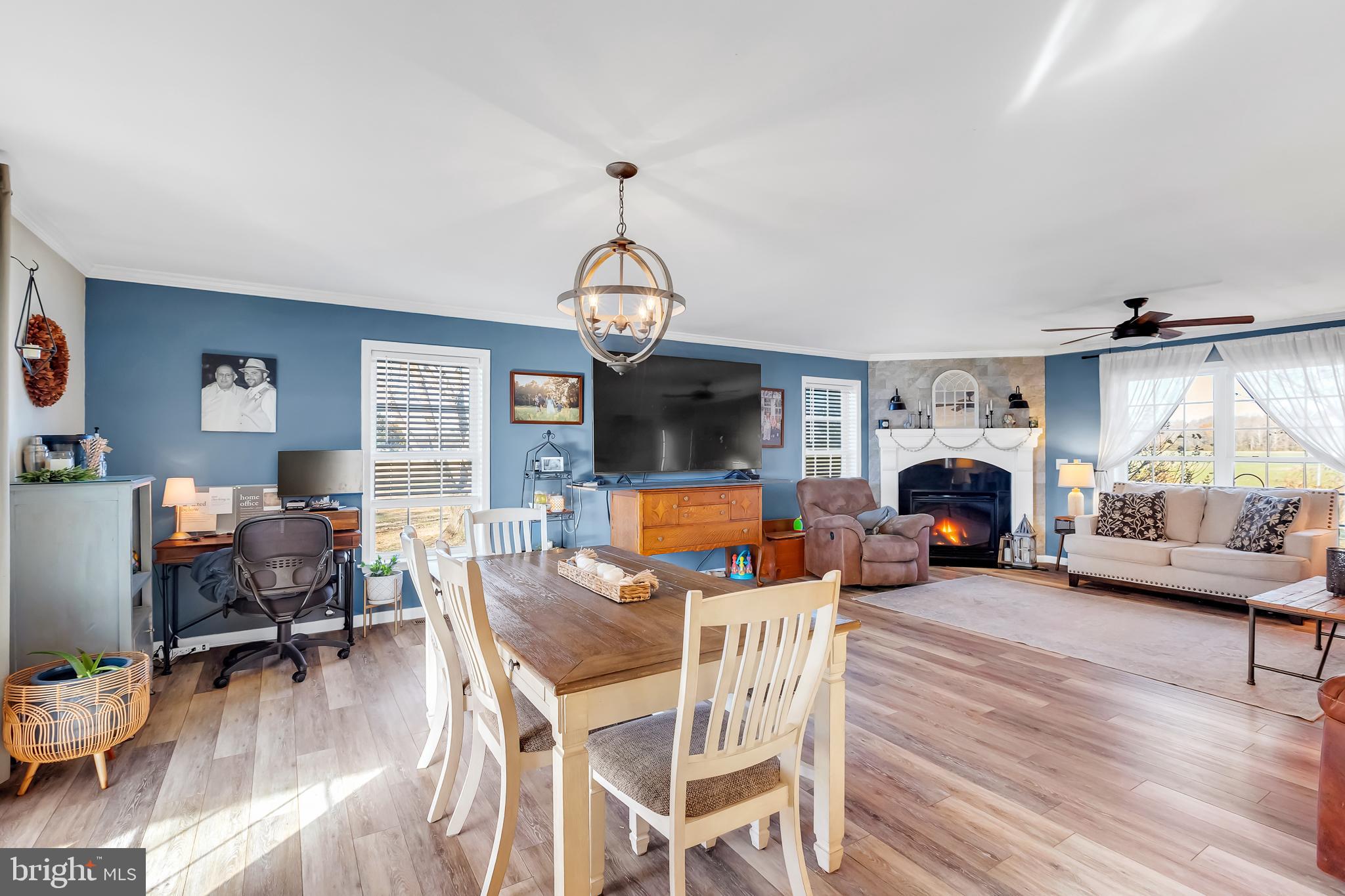 8960 Bacons Road Delmar, DE 19940 - Photo 13 of 51 a living room with furniture a flat screen tv and a window