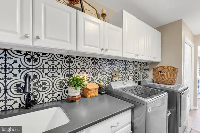 a kitchen with a stove and cabinets