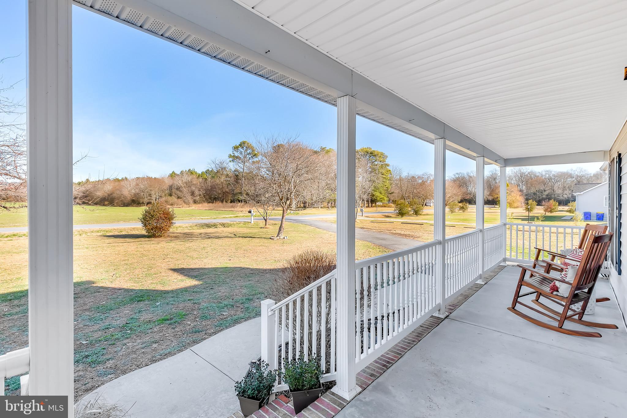 8960 Bacons Road Delmar, DE 19940 - Photo 3 of 51 a view of swimming pool with outdoor seating