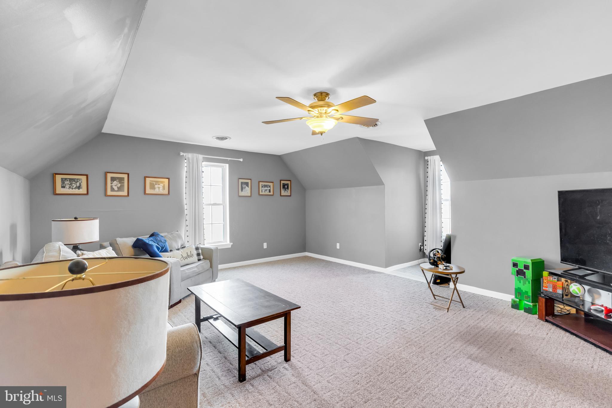 8960 Bacons Road Delmar, DE 19940 - Photo 32 of 51 a living room with furniture and a flat screen tv