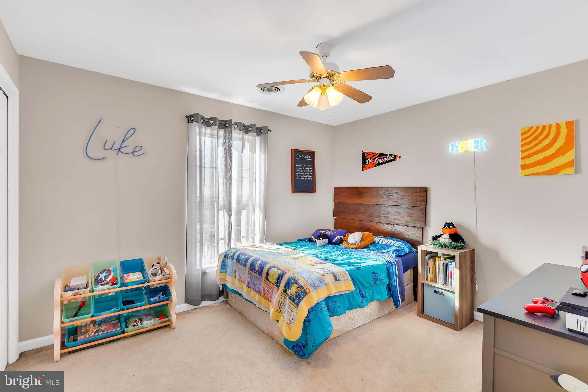 8960 Bacons Road Delmar, DE 19940 - Photo 42 of 51 a bedroom with a bed and a chandelier