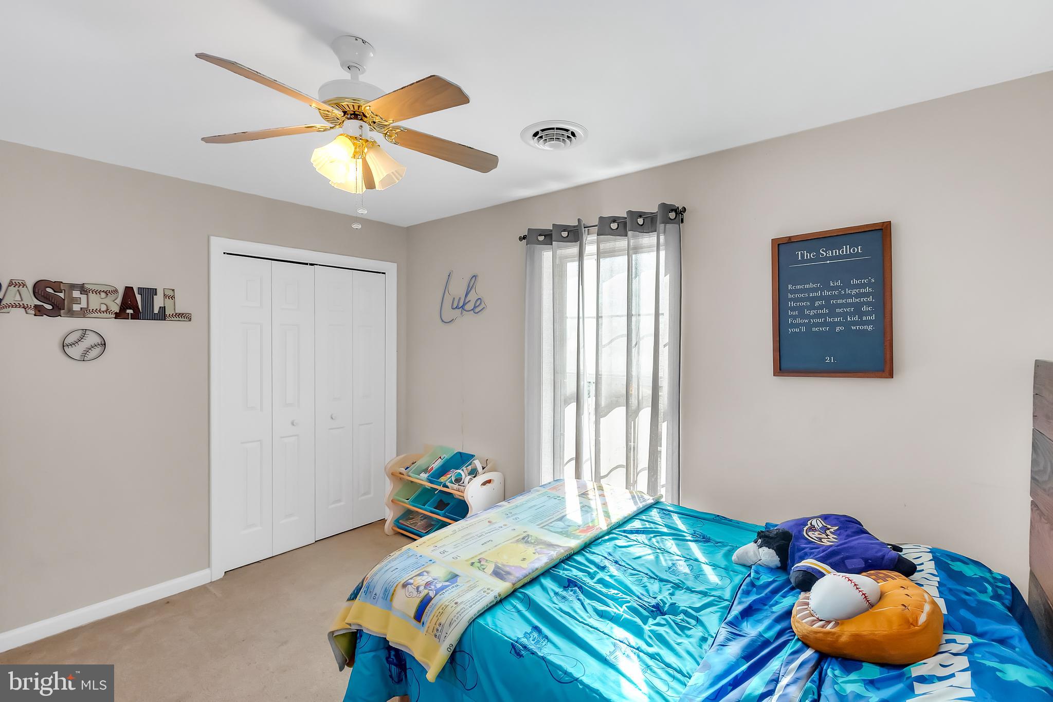 8960 Bacons Road Delmar, DE 19940 - Photo 43 of 51 a bedroom with a bed and a chandelier