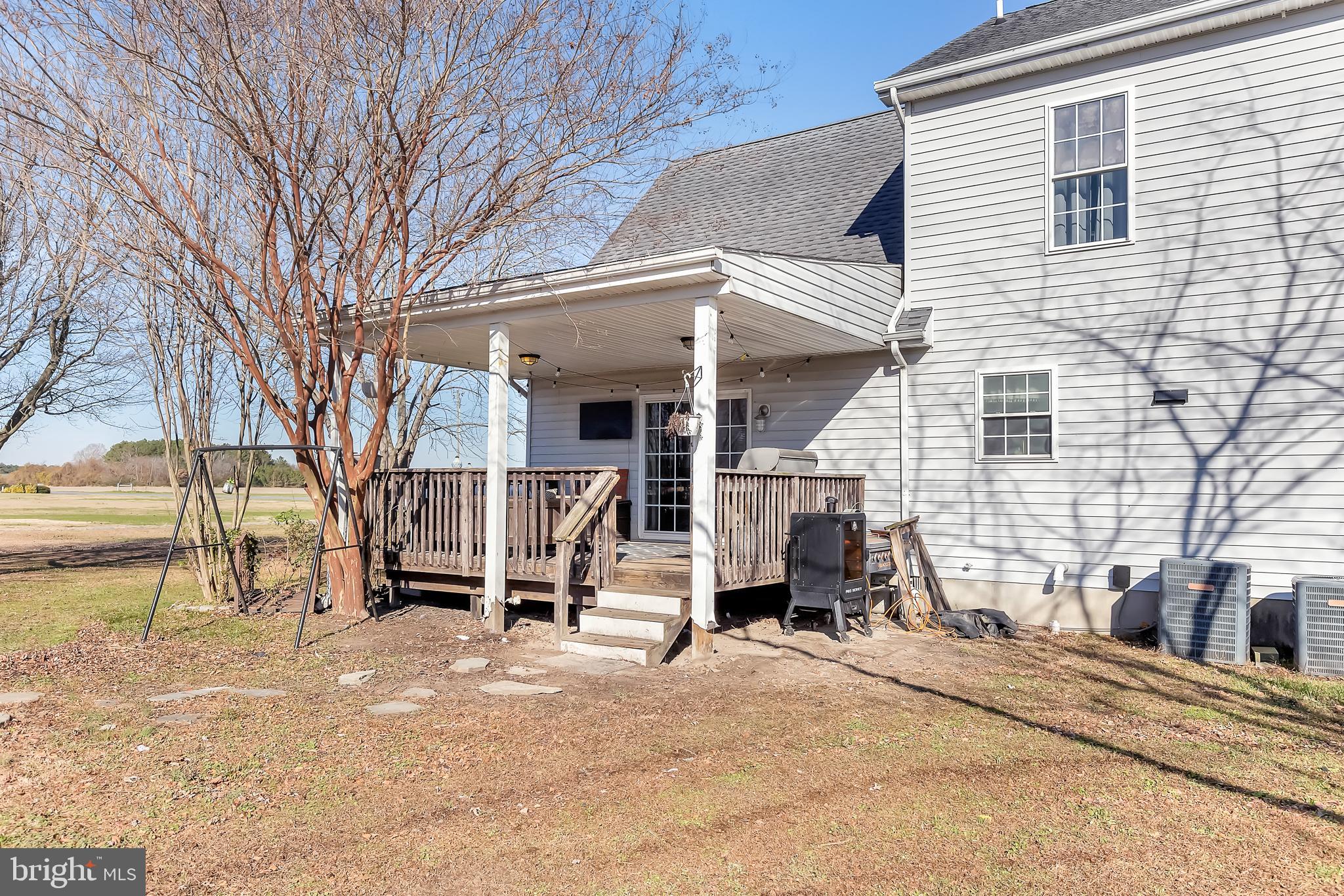 8960 Bacons Road Delmar, DE 19940 - Photo 46 of 51 a view of a house with a yard and large trees