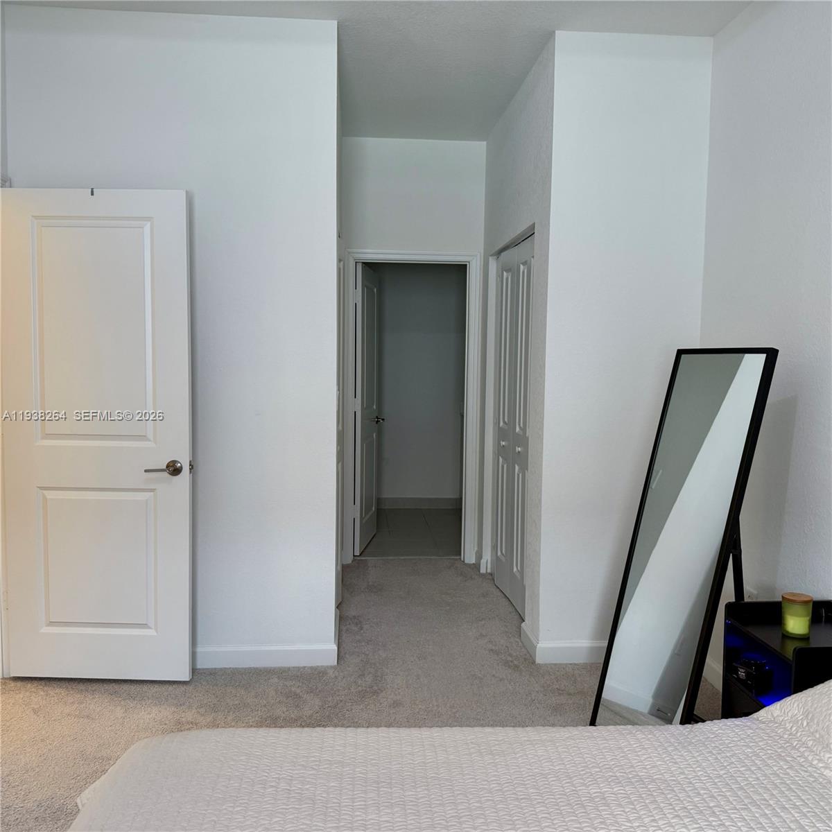23049 Southwest 129th Place Miami, FL 33177 - Photo 18 of 29 a view of a hallway to rooms
