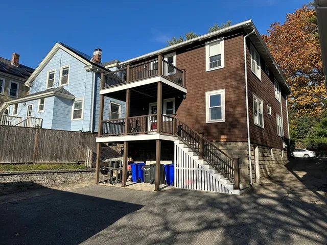 a view of a house with a street