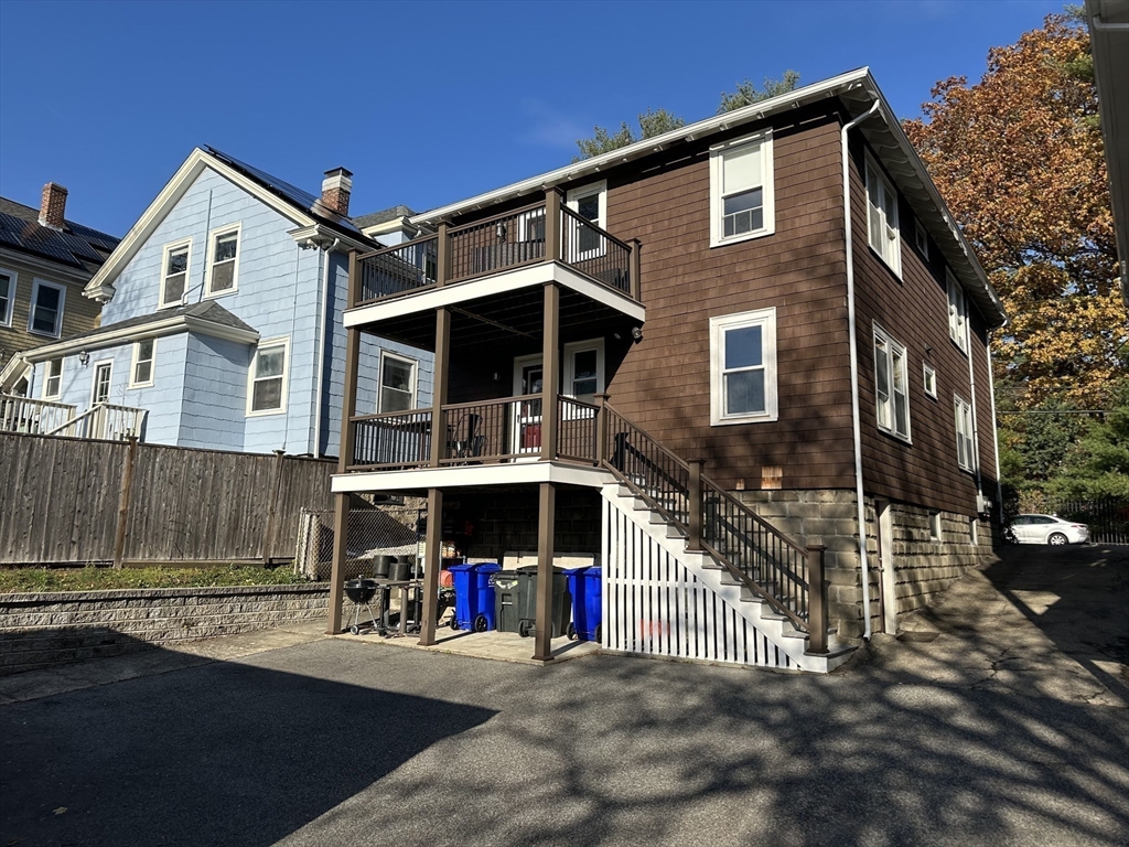 77 Walk Hill Street, Unit 1 Boston, MA 02130 - Photo 27 of 29 a view of a house with a street
