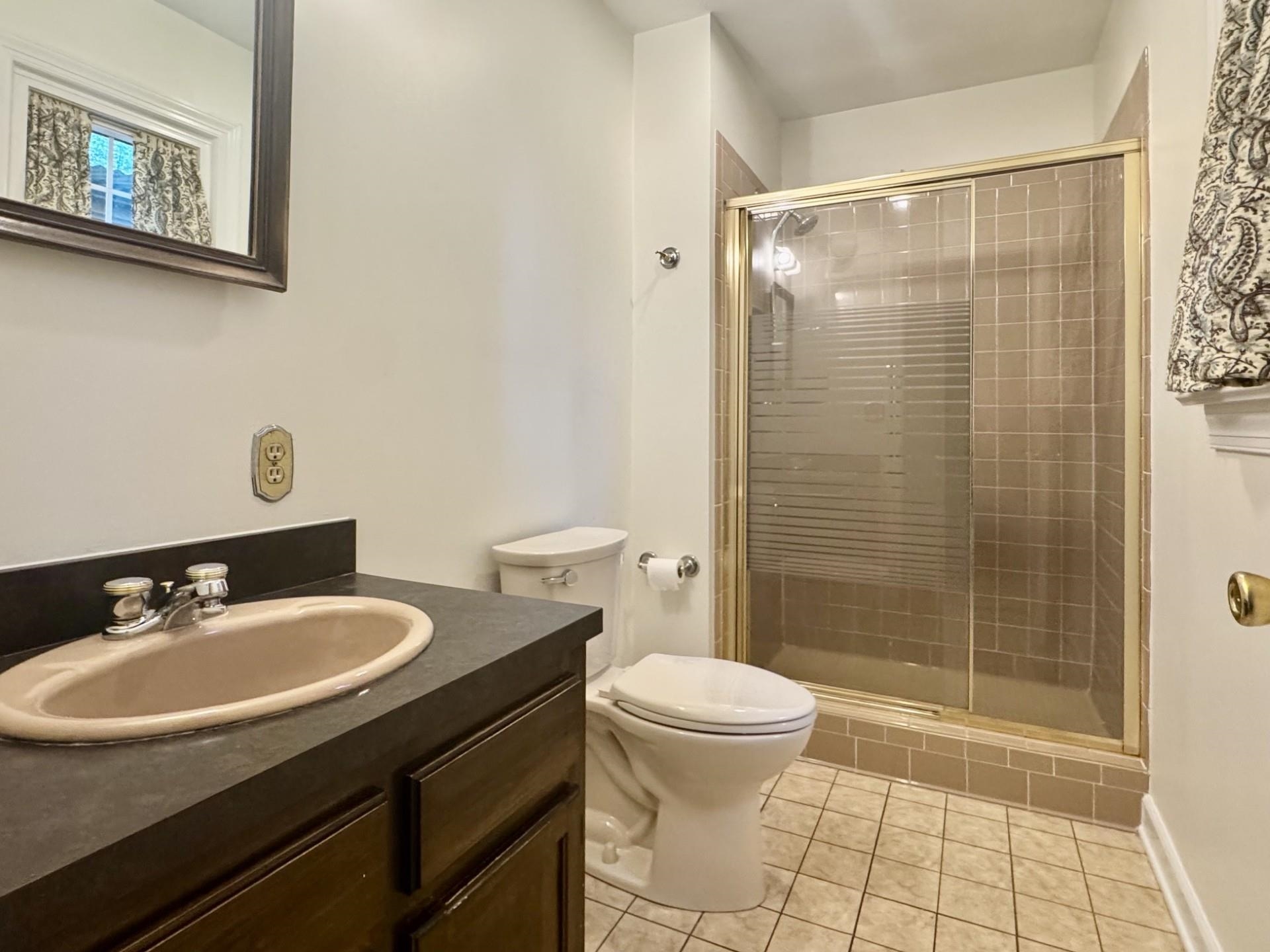 81 Middlebrook Street Harrisonburg, VA 22801 - Photo 10 of 22 a bathroom with a sink toilet and shower