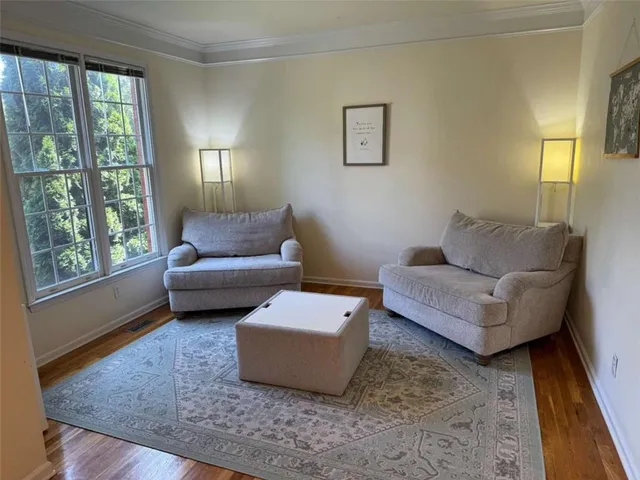 a living room with furniture and a couch