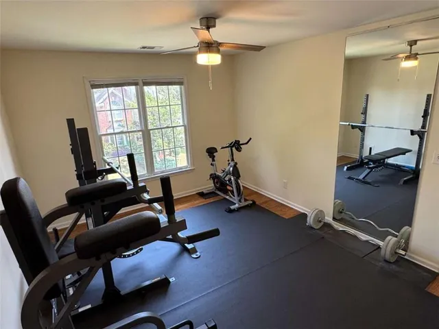 a view of a workspace with furniture