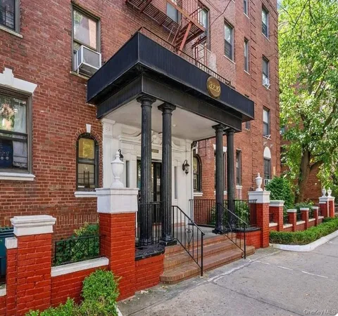 a view of a building with a street