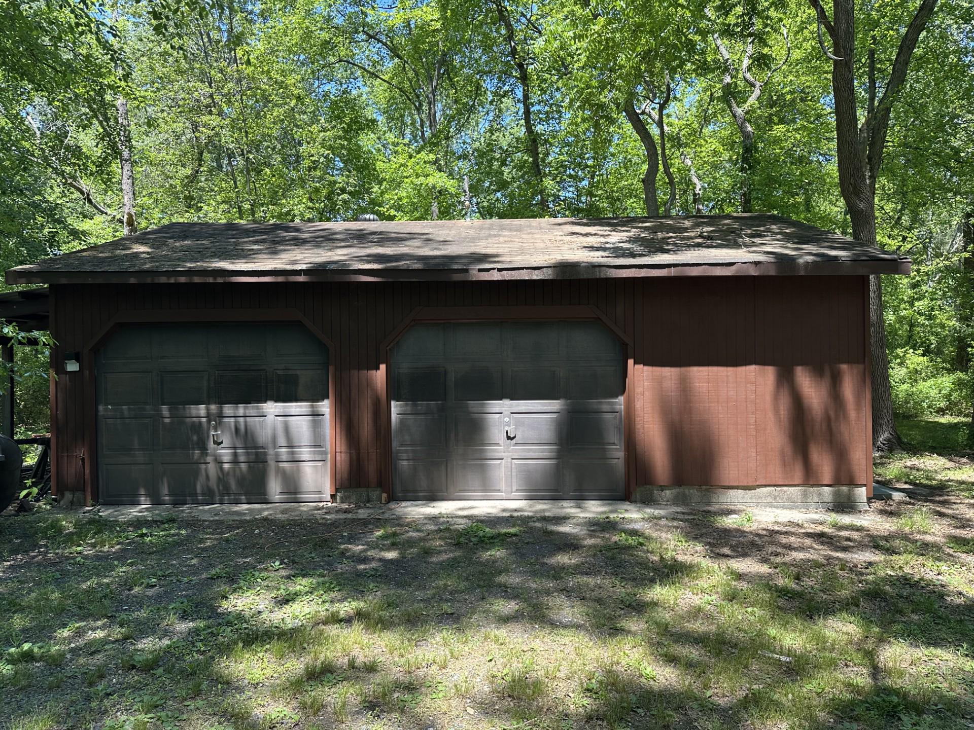 317 Magnolia Road Pemberton, NJ 08068 - Photo 6 of 42 a front view of a house with a garden